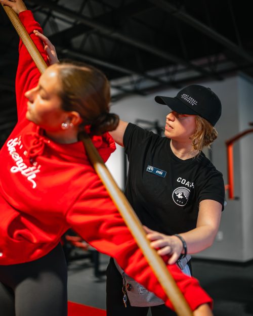 west coast strength-clackamas-stretch personal training coach working with member at the gym